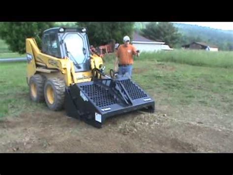 landscape rake for skid steer for sale|bobcat rock picker attachment.